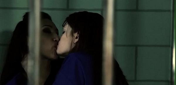  Young beauties pussylicking in prison cell